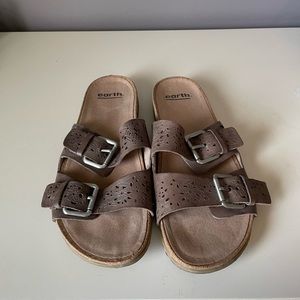 Earth brown leather sandals.